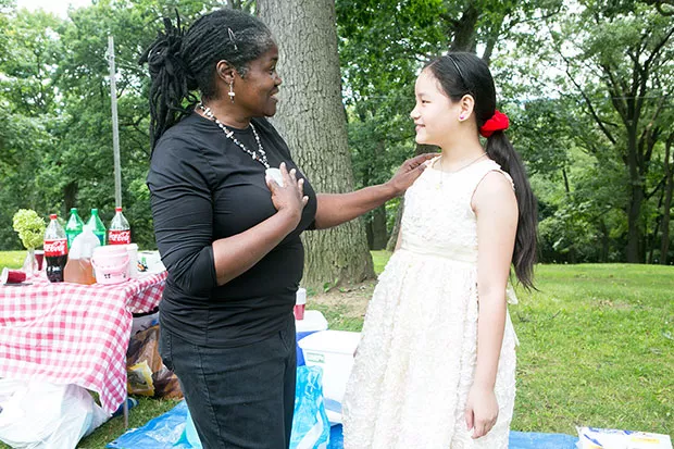 Artist Christine Bethea and Sumiran Rai at the NAMSC’s potluck dinner - CP PHOTO BY JOHN COLOMBO