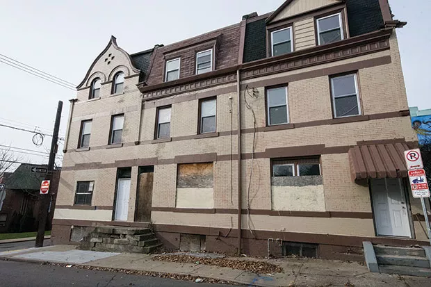 This series of vacant rowhouses on Gist Street has been owned by Bob Eckenrode since 2005. The façades were recently given a new coat of paint. - CP PHOTO BY JAKE MYSLIWCZYK