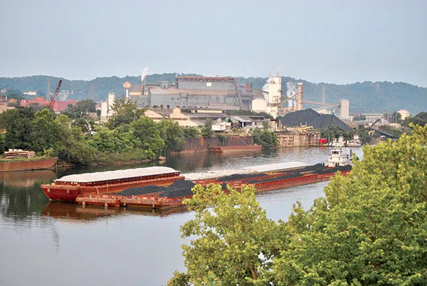 A coal barge on the Monongahela River in Braddock - CP PHOTO BY JAKE MYSLIWCZYK