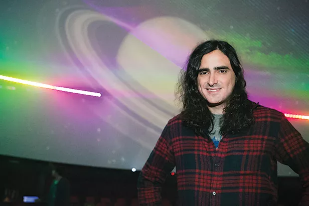 Andre Costello in the planetarium at Carnegie Science Center - CP PHOTO BY JOHN COLOMBO