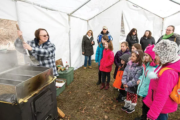 Judy Ruskowski, volunteer naturalist, demonstrating to scouts - CP PHOTO BY JOHN COLOMBO