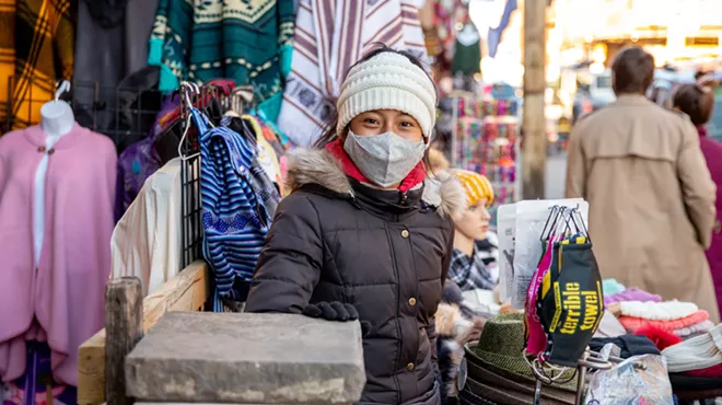 Bayelin Morain works sells merchandise outside her family&rsquo;s business, Native Inkas.