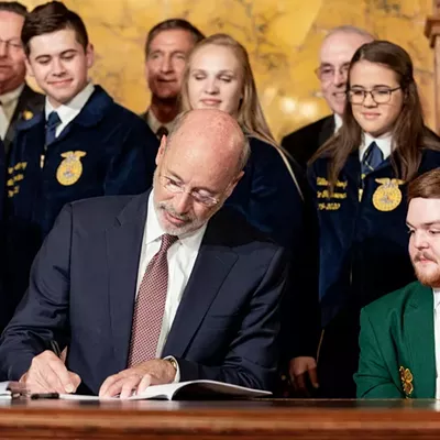 Governor Tom Wolf signing into law new legislation establishing the Pennsylvania Farm Bill on July 1, 2019.