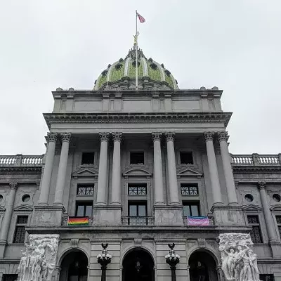 Pride flags are flown outside Lt. Gov. John Fetterman's capitol office