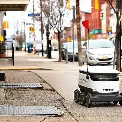 A Starship food delivery robot is seen along Liberty Avenue in Bloomfield in March 27.