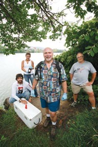 University of Pittsburgh researcher Dan Volz (center) and his crew on the north bank of the Monongahela, near the Hot Metal Bridge. (left to right: Drew Michanowicz, Samantha Malone and Chuck Christen) - HEATHER MULL