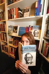 Word up: Pam Wilson, a Big Idea Collective member for five years, mans the bookstore's Chomsky collection. - HEATHER MULL