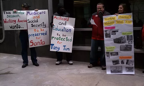 Working America protests at Sen. Bob Caseys office