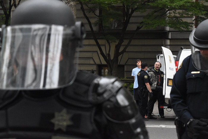 Portland cop watcher Mike Bluehair is arrested during a prolonged clash with police in downtown Portland.