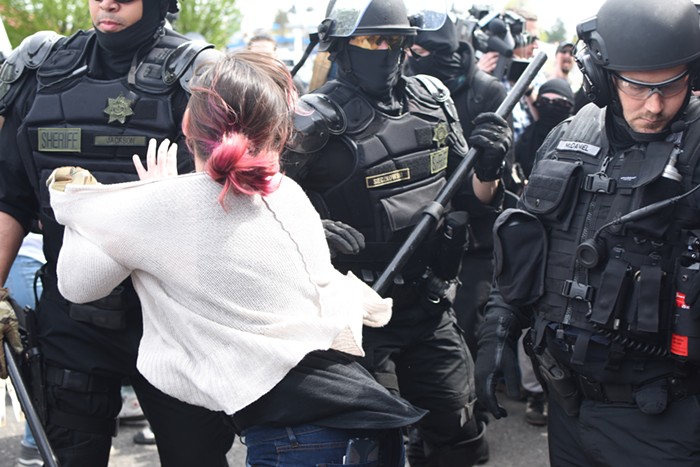 A MCSO cop grabbed this woman and, shortly later, me.