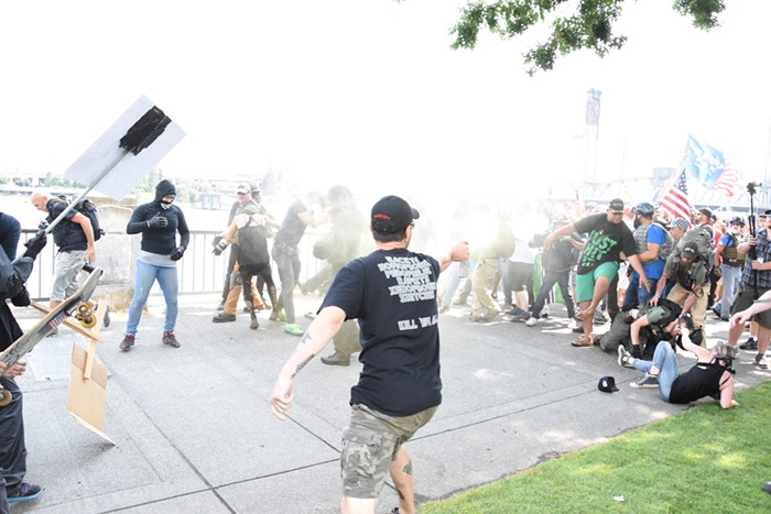 I didnt see what led to this guy spraying stuff at the Patriot Prayer crowd. A fight ensued.