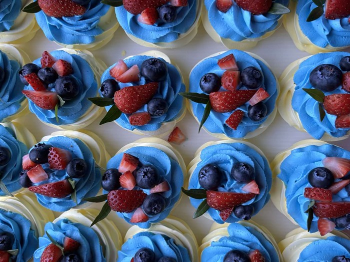 Fatima Mansur sells Ukrainian flag color pastries and cookies in her store, and wires the profits directly to Ukrainian families.