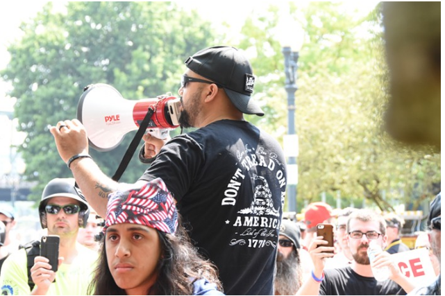 Patriot Prayers Joey Gibson at one his dumb Portland rallies in August