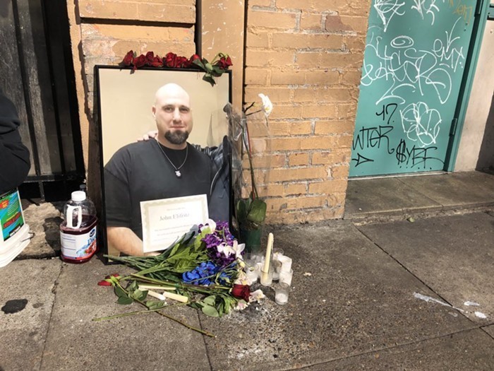 A memorial to Elifritz, placed outside the homeless shelter where he was killed.