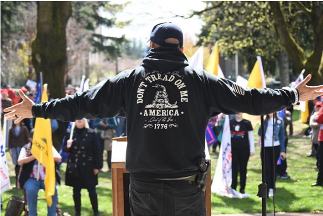 Joey Gibson speaking at a Patriot Prayer rally.