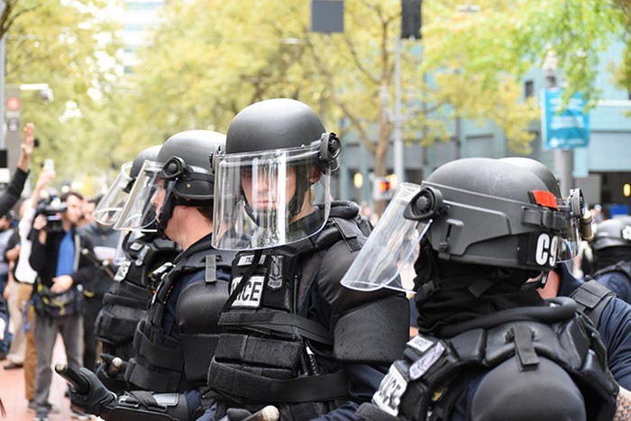 Portland police officers at a 2016 protest. Portland police officers at a 2016 protest.