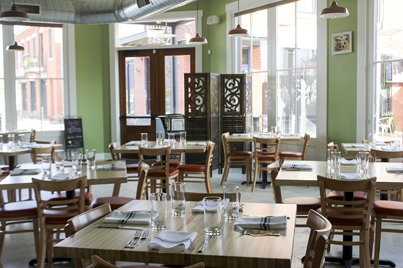 The light-filled dining room looks out onto New Town's charming business district. - CHERYL BAEHR