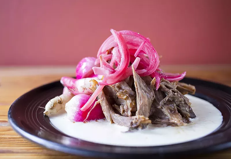 The braised lamb shoulder is a triumph. - MABEL SUEN