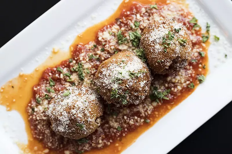 Arancini are a terrific version of the Sicilian classic. - MABEL SUEN