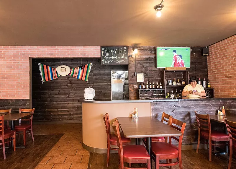 The dining room is cozy, with a large patio just outside. - MABEL SUEN