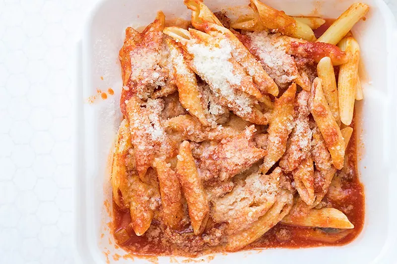 Mostaccioli includes housemade meat sauce and Parmesan cheese. - MABEL SUEN