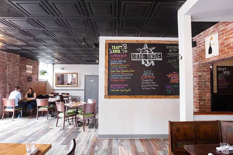 The full bar includes a vast whiskey selection. - MABEL SUEN