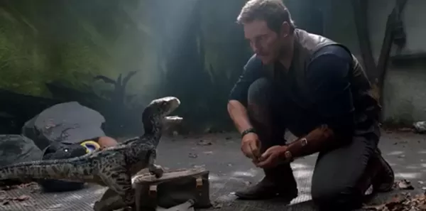 Owen (Chris Pratt) tries to explain who Greg Evigan is to one of the younger readers. - (C) UNIVERSAL PICTURES 2018
