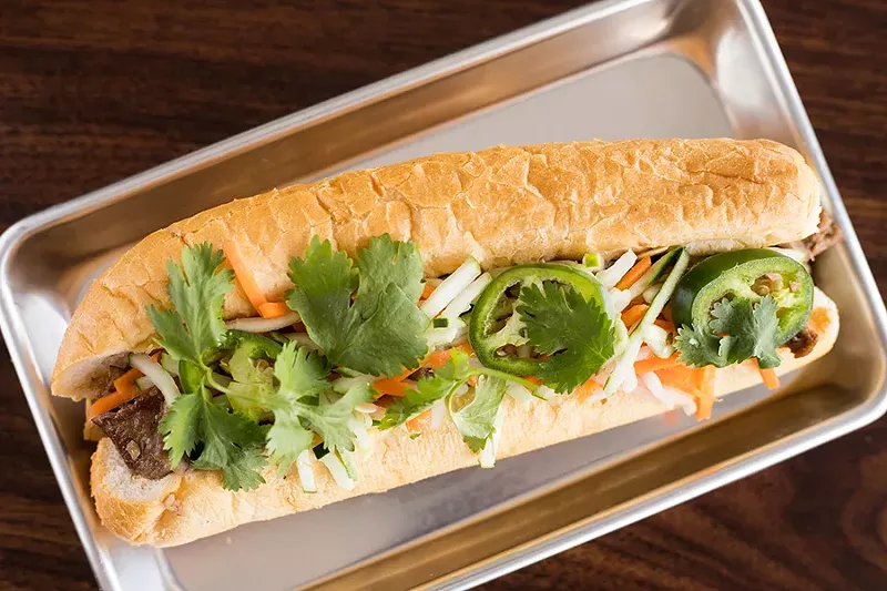 Bánh mì is topped with a pickled medley and house mayo, but no pâté. - MABEL SUEN