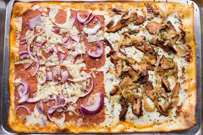 It's square, but it's not traditional St. Louis-style pizza. - MABEL SUEN