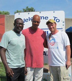 Reed and community activist Brian Matthews (right) stand beside Hopeville camp leader, Moe. - PHOTOS: RORY ROUNDTREE