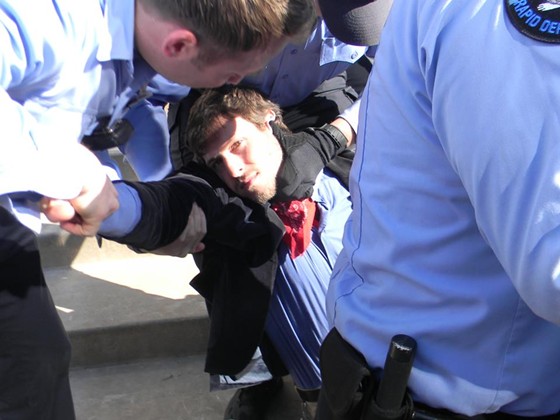 Peabody protester getting arrested in St. Louis. - VIA FACEBOOK