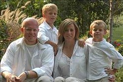 Christopher Coleman with his wife, Sheri, and sons Gavin and Garett.