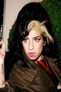 Amy Winehouse, formerly a professor of physics at Cambridge, is seen here after an hour of ESPN's baseball coverage.