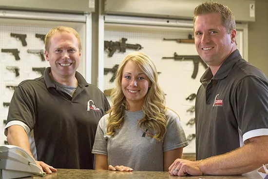 Staff at the shooting range.