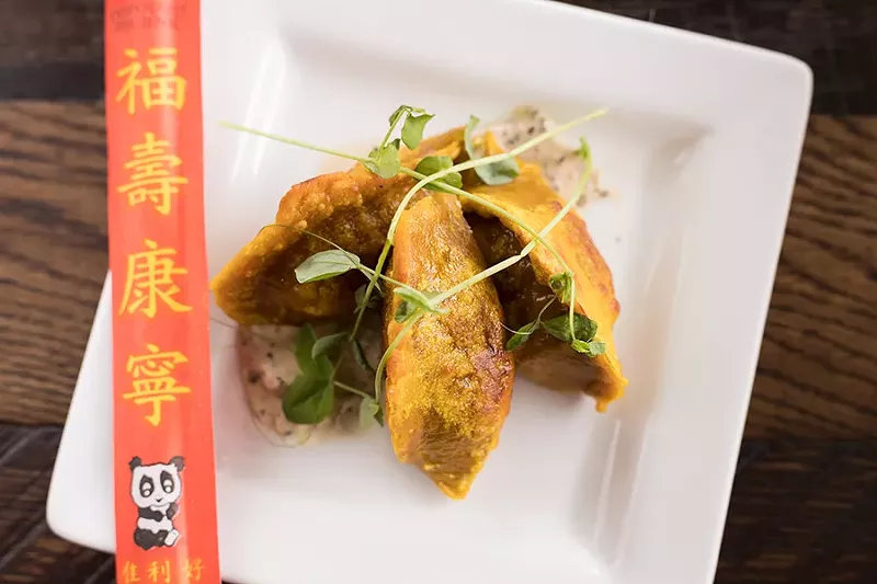 Chorizo date potstickers are wrapped in turmeric dough. - MABEL SUEN