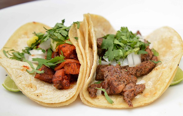 Tacos al pastor (pork loin) and res (beef) tacos are cheap and tasty around $3. - TOM HELLAUER