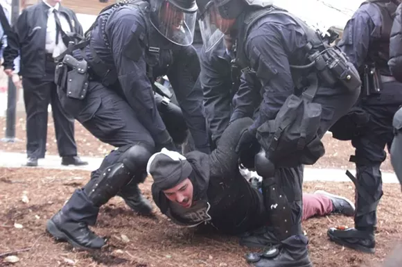 Protesters arrested in the past year are now receiving surprise summonses from St. Louis County. - DANNY WICENTOWSKI