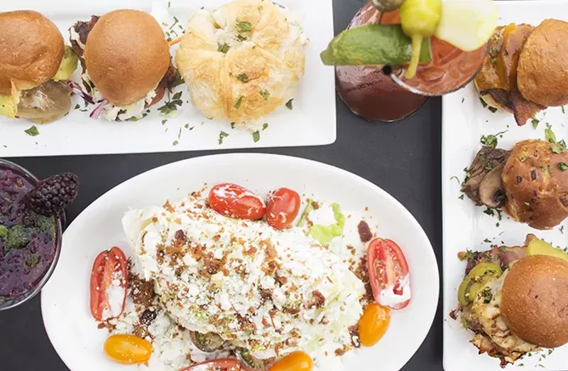 Petite sandwiches, cocktails and a wedge salad. - MABEL SUEN
