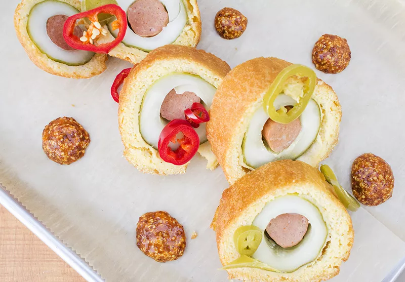 The "Tickled Pickle": Served like haute cuisine, it's actually a hot-dog-stuffed pickle, breaded like a corn dog. - MABEL SUEN