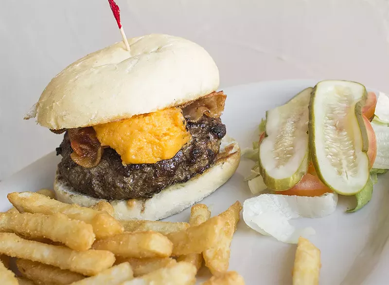 The burger and fries at Dados Cafe. - PHOTO BY MABEL SUEN