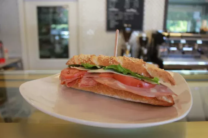 A selection of savory offerings, like sandwiches and quiches, are available daily. - CHERYL BAEHR