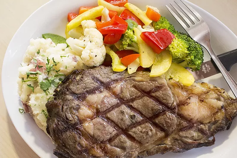 Daily specials include items such as a ten-ounce prime rib with mashed potatoes, gravy and roasted vegetables. - PHOTO BY MABEL SUEN