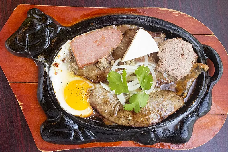 The sizzling steak, a house special. - PHOTO BY MABEL SUEN
