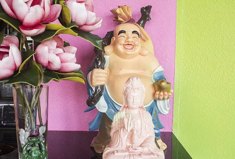 The restaurant features a pink-and-green lotus blossom theme. - PHOTO BY MABEL SUEN