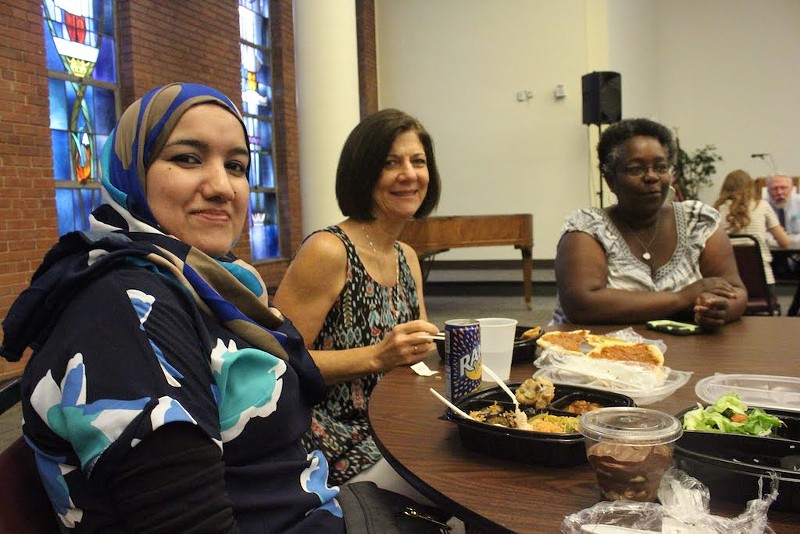 Safaa Abdullah (pictured on the left) says whether the food is American or Arabic, "it is very delicious." - KATIE COUNTS