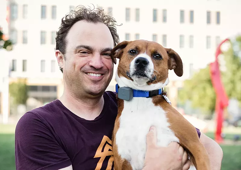 Jon Porter and his pal Rusty have both made friends at a Saint Louis University dog park. - STEPHEN KENNEDY