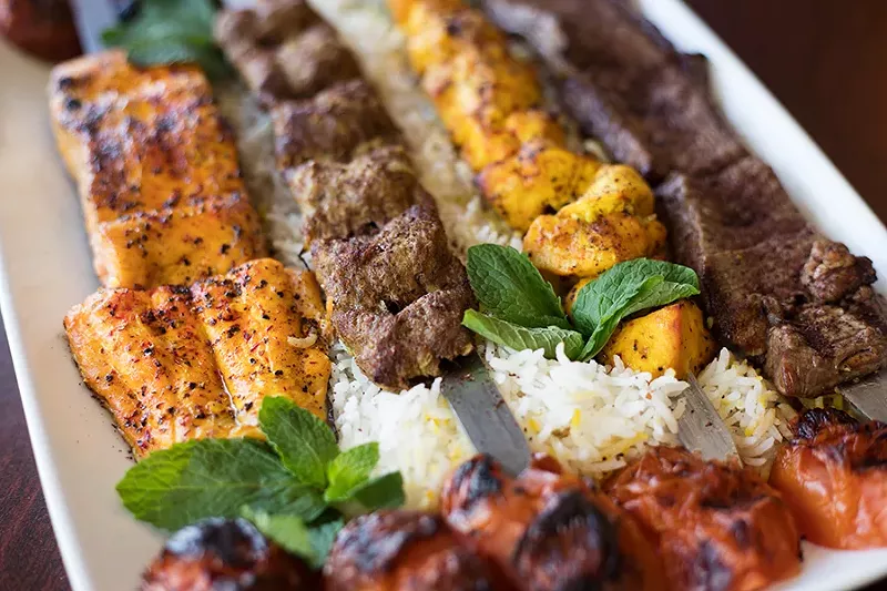 The kabob platter includes salmon, beef koobideh (ground beef), chicken and filet. - MABEL SUEN