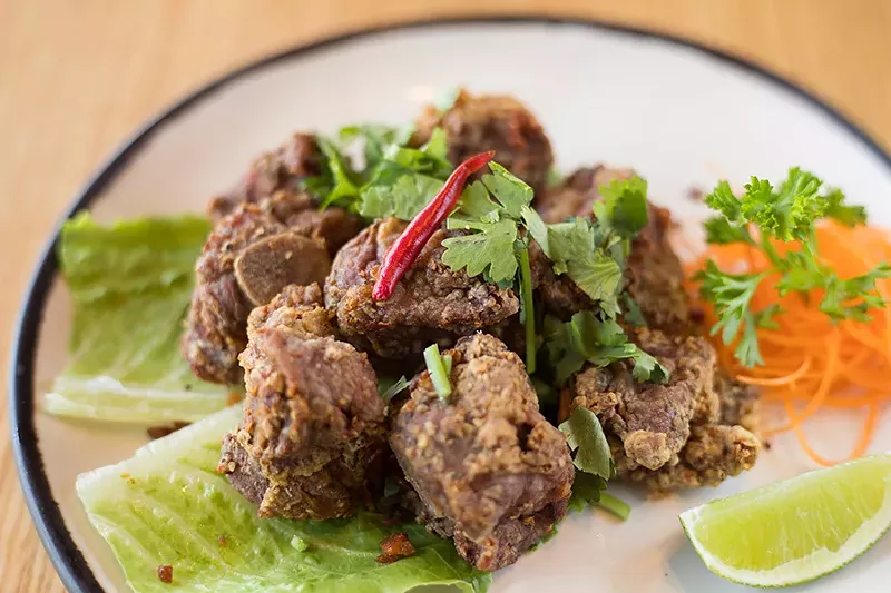 Before being breaded and fried, the pork riblets are marinated in soy, garlic and Golden Mountain sauce (a Thai sauce made from fermented soybeans), which imbues the meat with umami. - MABEL SUEN