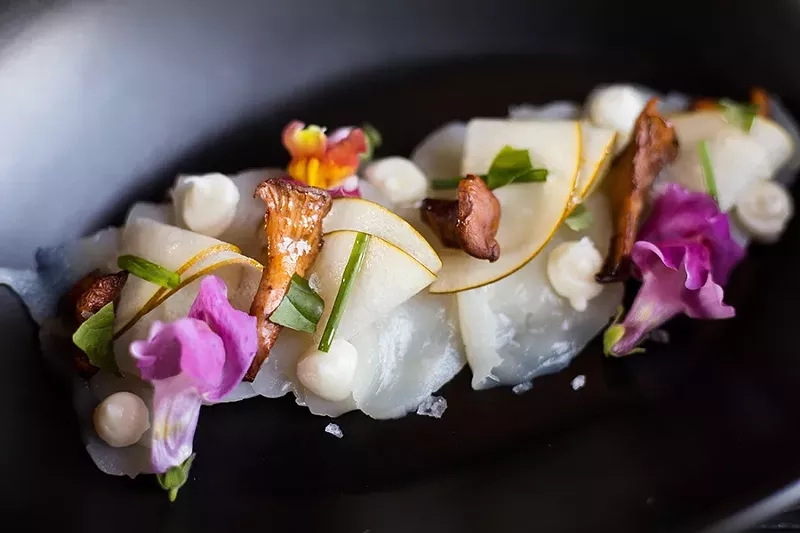Thin slices of scallop carpaccio are so creamy you feel as if you are eating a tempered pat of butter that melts on the tongue. - MABEL SUEN