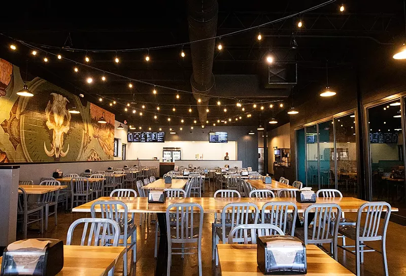 Inside, BEAST Butcher & Block includes a traditional fast-casual smokehouse with a large open dining room and order counter. - MABEL SUEN